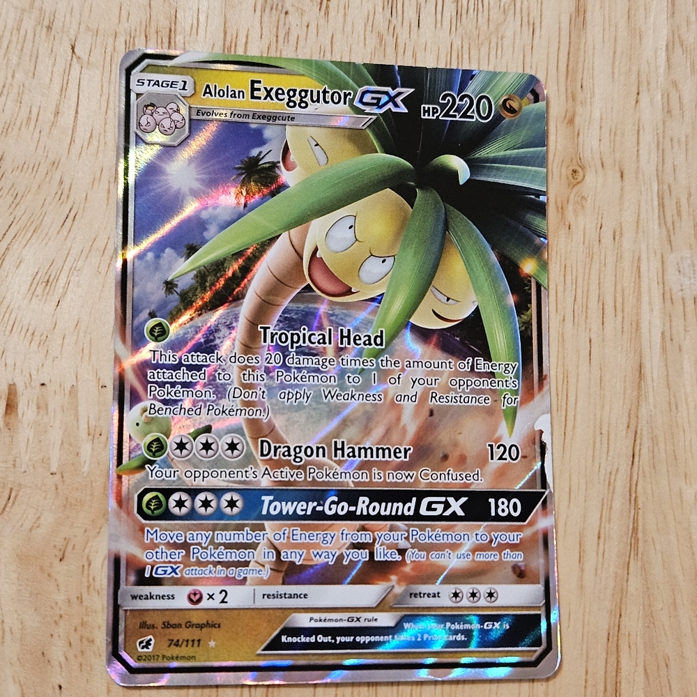 Alolan Exeggutor GX holo 74/111 w/ Mew card sleeve